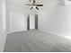 Spacious bedroom with gray carpet and ceiling fan at 813 Kimpton Ct, Fuquay Varina, NC 27526