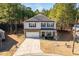 Two-story house on a tree-lined street with a driveway at 98 Panmure, Rocky Mount, NC 27804