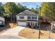 Two-story house on a tree-lined street with a driveway at 98 Panmure, Rocky Mount, NC 27804