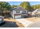 Two-story house on a tree-lined street with a driveway at 98 Panmure, Rocky Mount, NC 27804