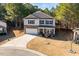 Two-story house on a tree-lined street with a driveway at 98 Panmure, Rocky Mount, NC 27804