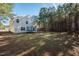 Spacious backyard with trampoline and tree line at 98 Panmure, Rocky Mount, NC 27804