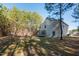 Large backyard with trampoline and fire pit at 98 Panmure, Rocky Mount, NC 27804