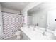 Bathroom with double vanity and butterfly shower curtain at 98 Panmure, Rocky Mount, NC 27804