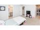 Bedroom with twin bed, TV, and en-suite bathroom at 98 Panmure, Rocky Mount, NC 27804