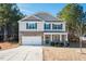 Two-story house with stone accents and a two-car garage at 98 Panmure, Rocky Mount, NC 27804