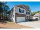 Two-story house with stone accents and a two-car garage at 98 Panmure, Rocky Mount, NC 27804