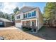 Two-story house with stone accents and a covered porch at 98 Panmure, Rocky Mount, NC 27804