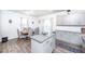 Kitchen with island, granite countertops, and eat-in dining area at 98 Panmure, Rocky Mount, NC 27804