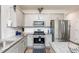 Modern kitchen with stainless steel appliances and granite countertops at 98 Panmure, Rocky Mount, NC 27804
