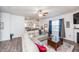 Open living room with sectional sofa and wood flooring at 98 Panmure, Rocky Mount, NC 27804
