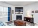 Cozy living room with fireplace and built-in shelving at 98 Panmure, Rocky Mount, NC 27804