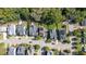 Stunning aerial view of homes showcasing landscaped yards, solar panels, and neighborhood street appeal at 1000 Norris St, Raleigh, NC 27604