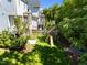 Spacious backyard featuring a wooden playset perfect for Gathering fun at 1000 Norris St, Raleigh, NC 27604