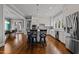Bright and modern kitchen with stainless steel appliances, island seating, and hardwood floors at 1000 Norris St, Raleigh, NC 27604