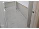 White tiled bathroom floor with built-in bench seating at 1014 E Jones St, Raleigh, NC 27601
