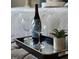 Closeup of a tray with wine glasses and bottle, adding a touch of elegance at 1014 E Jones St, Raleigh, NC 27601