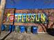 Building with a mural and recycling bins at 1014 E Jones St, Raleigh, NC 27601