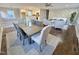 Spacious living area with hardwood floors, dining area, and stylish decor at 1014 E Jones St, Raleigh, NC 27601