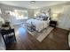 Large main bedroom with hardwood floors, large window, and ample space at 1014 E Jones St, Raleigh, NC 27601