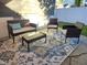Relaxing patio furniture on a patterned rug at 1014 E Jones St, Raleigh, NC 27601