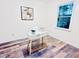 Cozy bedroom featuring a modern desk, bright window, and stylish decor at 103 Cimmaron Ct, Cary, NC 27511