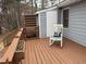 Charming deck with rocking chair, flower boxes, and an outdoor storage shed at 103 Cimmaron Ct, Cary, NC 27511