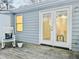 Home exterior showcasing a deck and french doors leading inside at 103 Cimmaron Ct, Cary, NC 27511