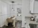Well-lit kitchen and dining nook with pendant lighting, modern finishes, and eat-in dining at 103 Cimmaron Ct, Cary, NC 27511