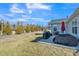 Private backyard patio with grill and plenty of space for outdoor entertaining at 1206 Newton Dr., Mebane, NC 27302