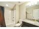 Clean bathroom with tub, shower, and granite vanity at 1206 Newton Dr., Mebane, NC 27302