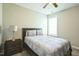 Cozy bedroom with a full-size bed and a nightstand at 1206 Newton Dr., Mebane, NC 27302