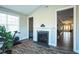 Bonus room with fireplace and exercise bike, offering versatile living space at 1206 Newton Dr., Mebane, NC 27302