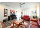 Comfortable living room featuring a ceiling fan, neutral paint and shuttered windows at 125 Canary Ct. Ct, Raleigh, NC 27610