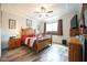 Well-lit main bedroom with tray ceiling, ceiling fan and neutral paint scheme at 125 Canary Ct. Ct, Raleigh, NC 27610