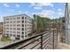 Balcony view of building and parking lot at 1300 St Marys St # 404, Raleigh, NC 27605