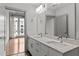 Modern bathroom with double vanity and marble countertops at 1300 St Marys St # 404, Raleigh, NC 27605