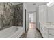 Spa-like bathroom with soaking tub and walk-in shower at 1300 St Marys St # 404, Raleigh, NC 27605