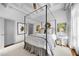 Bright bedroom with a canopy bed and plenty of natural light at 1300 St Marys St # 404, Raleigh, NC 27605