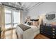 Main bedroom with king-size bed and ensuite bathroom at 1300 St Marys St # 404, Raleigh, NC 27605