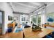Open concept dining area with hardwood floors and city views at 1300 St Marys St # 404, Raleigh, NC 27605