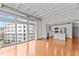 Modern white kitchen with stainless steel appliances and island at 1300 St Marys St # 404, Raleigh, NC 27605