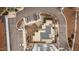Aerial view of a community pool area with surrounding patio and parking at 1300 St Marys St # 404, Raleigh, NC 27605