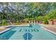 Community pool with surrounding lounge chairs at 1300 St Marys St # 404, Raleigh, NC 27605
