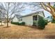 Charming one-story home featuring a screened-in porch and a well-maintained yard at 1400 Basley St, Wake Forest, NC 27587