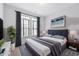 Comfortable bedroom featuring natural light, carpeting, and modern decor at 1400 Basley St, Wake Forest, NC 27587