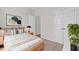 This bedroom features a comfortable bed, stylish decor, and ample natural light at 1400 Basley St, Wake Forest, NC 27587