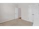 A clean and empty bedroom provides versatility and neutral carpet at 1400 Basley St, Wake Forest, NC 27587