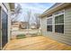 Wood deck with railing overlooking the backyard and neighborhood at 1400 Basley St, Wake Forest, NC 27587