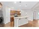 Stylish kitchen with an island, stainless steel appliances, and rich wood cabinets at 1400 Basley St, Wake Forest, NC 27587